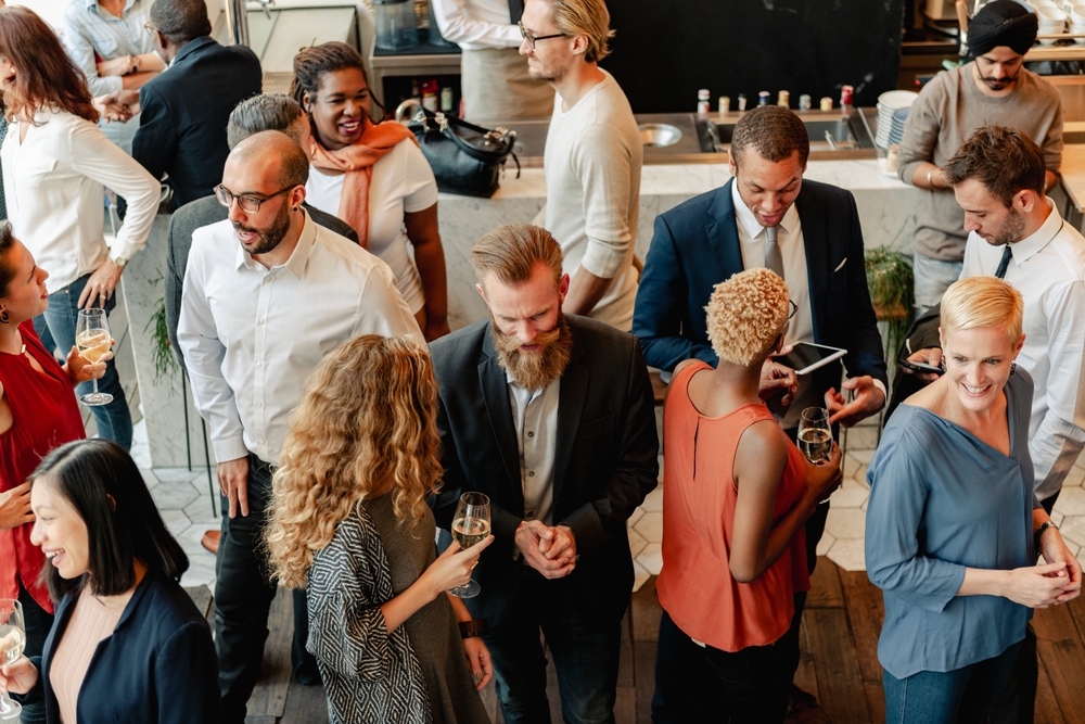 people networking at a corprate event.