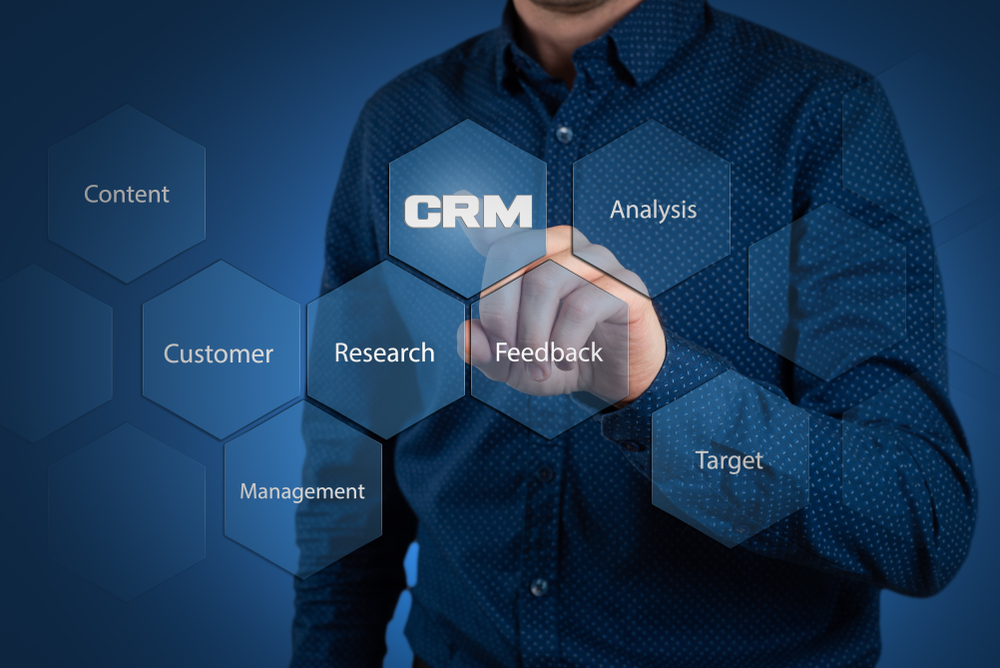 male pointing at crm